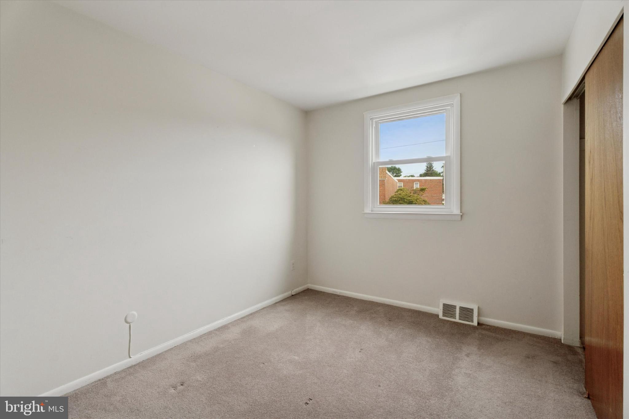 7429 Keiffer Street Philadelphia, PA 19128 - Photo 15 of 35 an empty room with a window