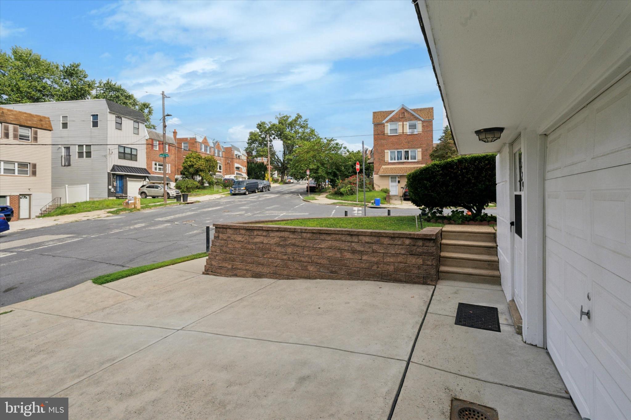 7429 Keiffer Street Philadelphia, PA 19128 - Photo 2 of 35 a view of street with tall buildings