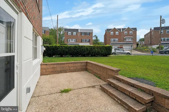 a view of backyard with a garden and plants