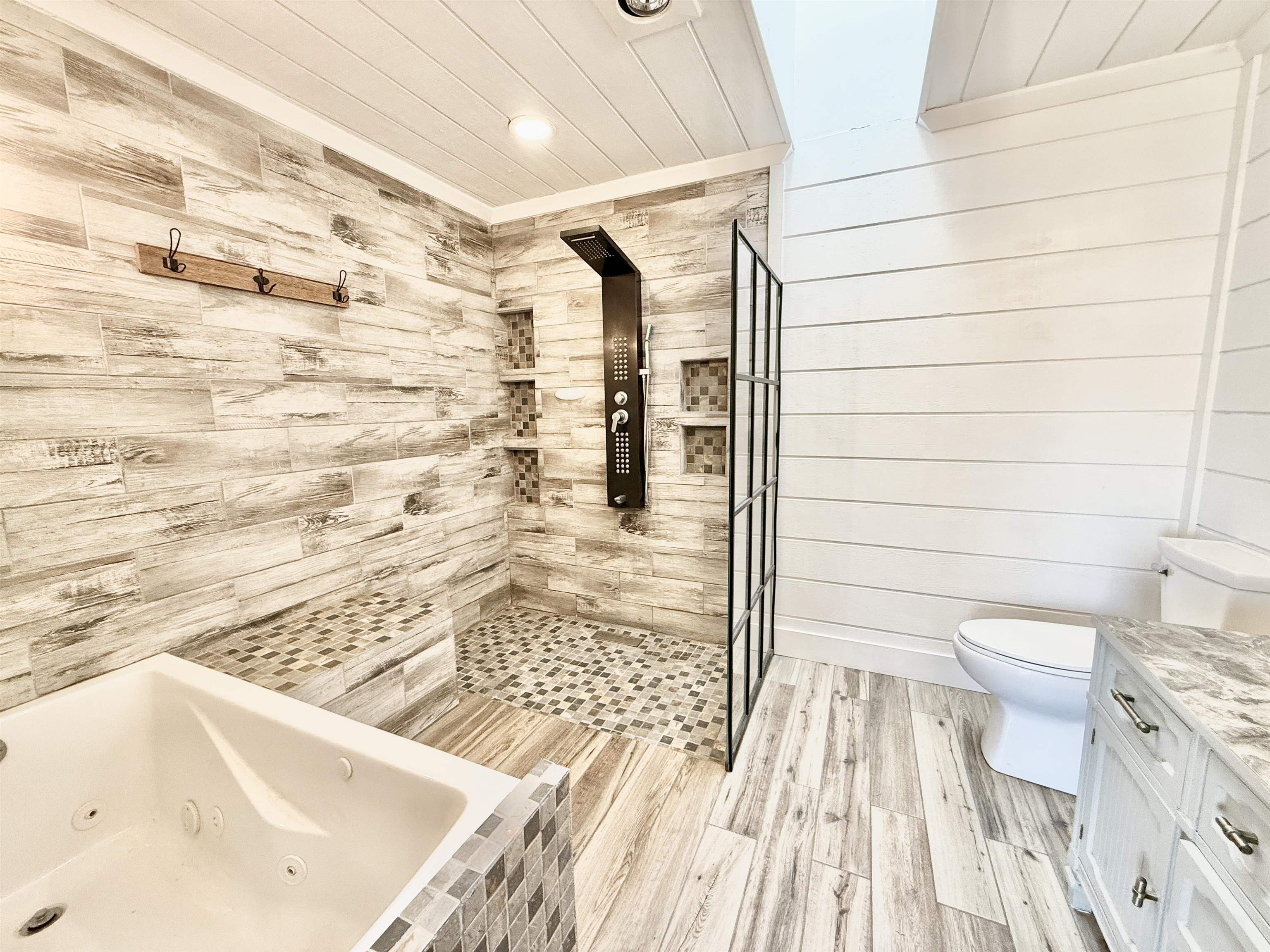 11245 Fox Trail Road Durand, IL 61024 - Photo 23 of 56 a bathroom with a sink and a shower