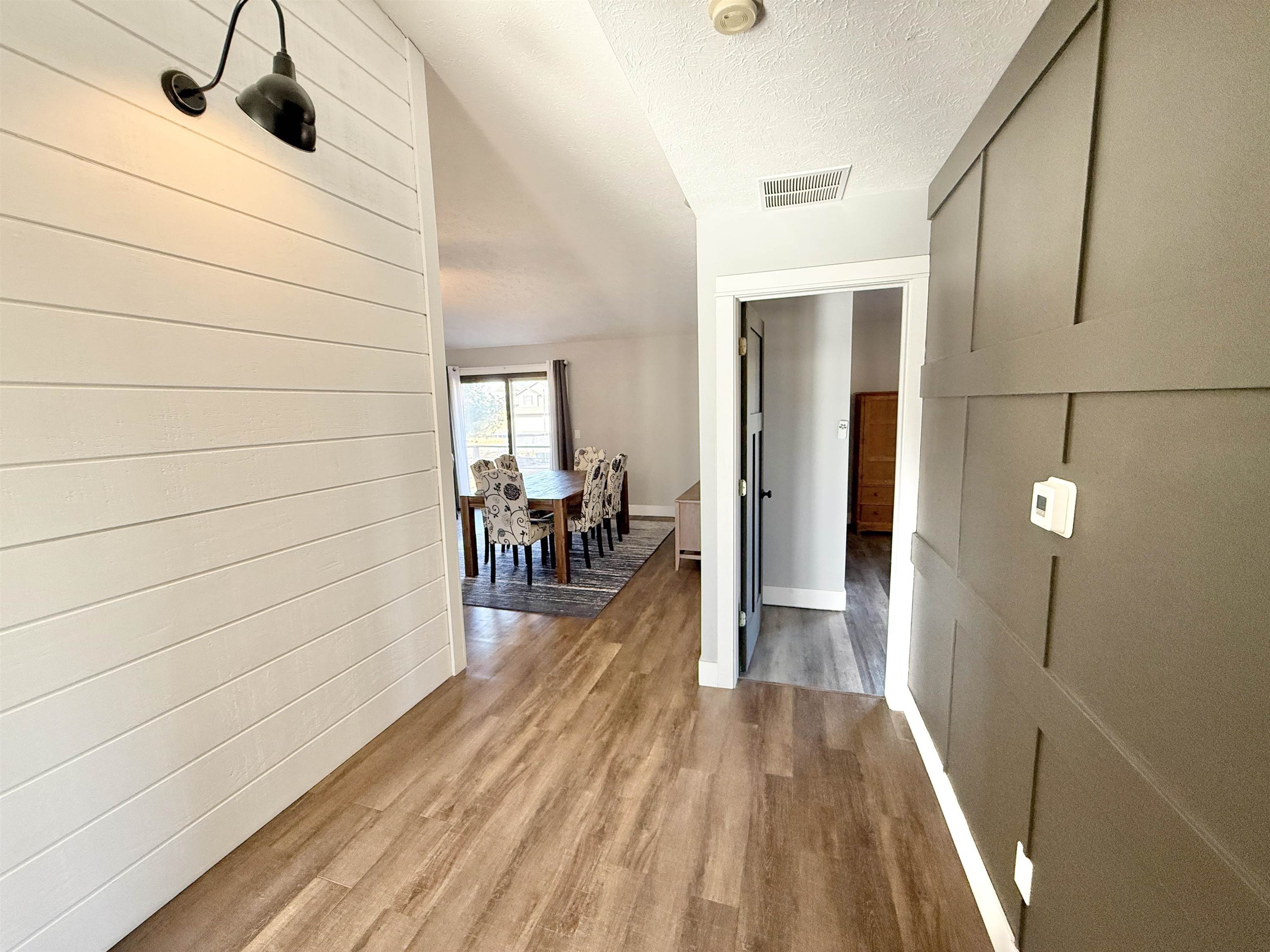 11245 Fox Trail Road Durand, IL 61024 - Photo 27 of 56 a view of a hallway with wooden floor and staircase