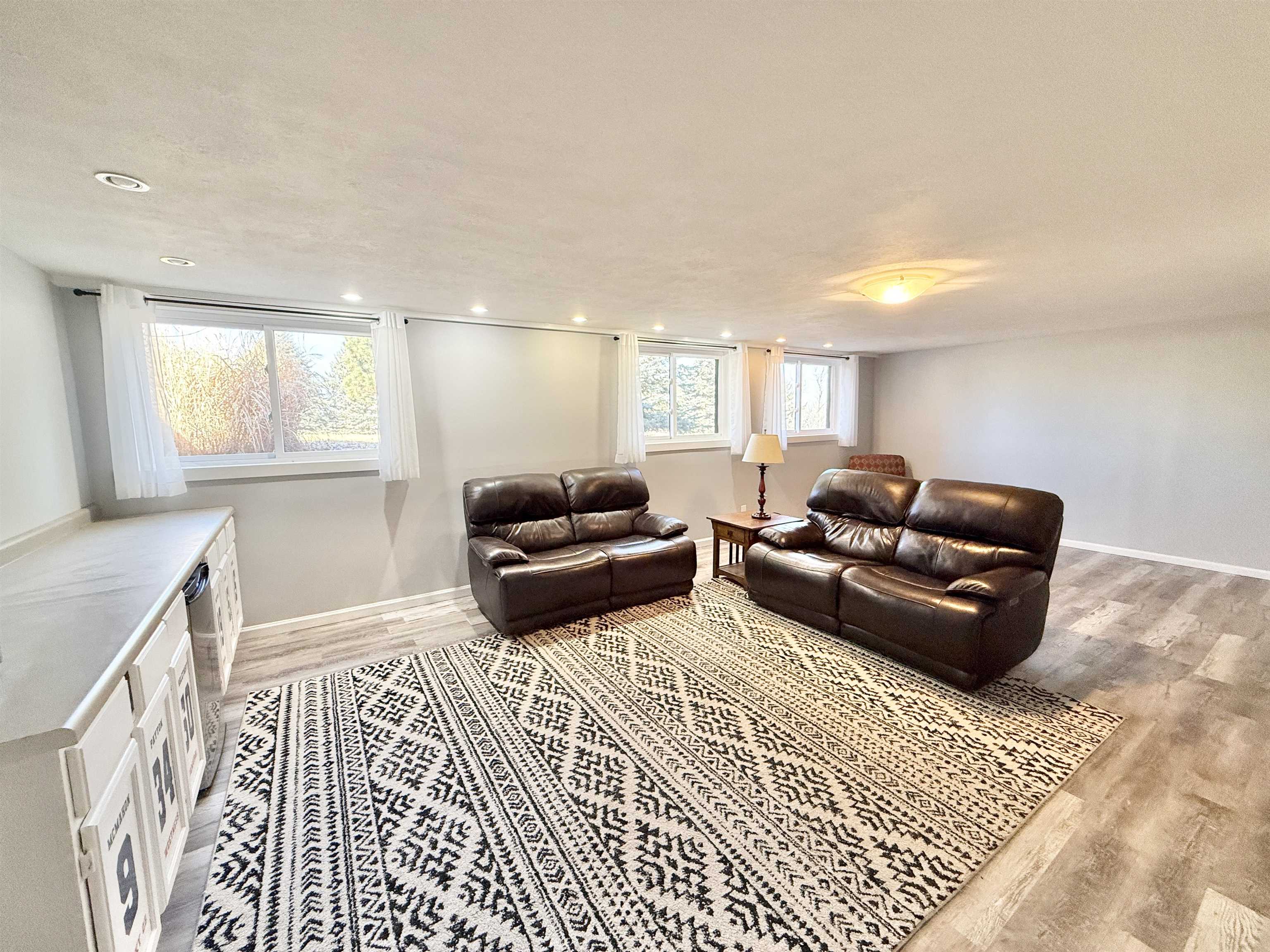 11245 Fox Trail Road Durand, IL 61024 - Photo 34 of 56 a living room with furniture and a rug