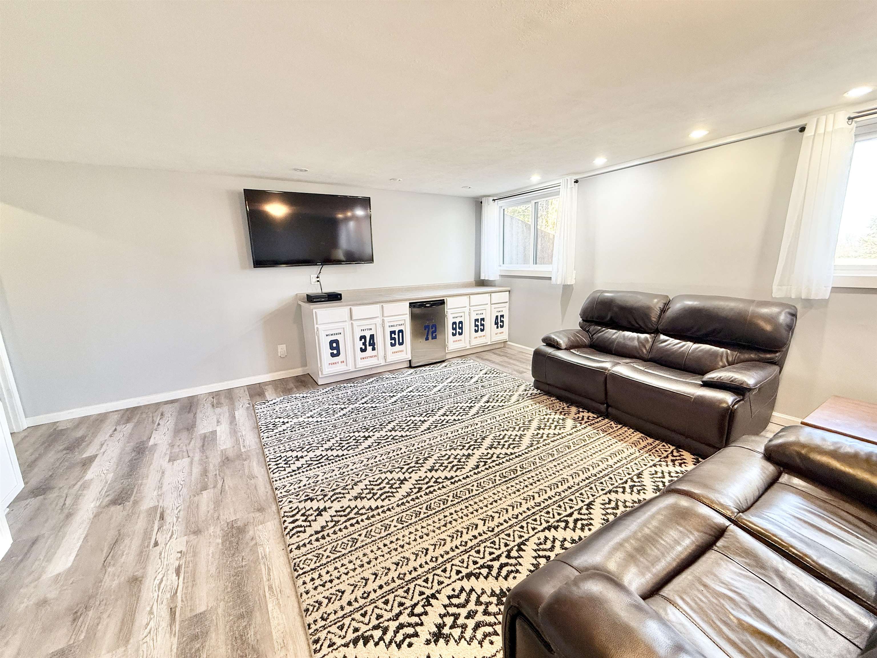 11245 Fox Trail Road Durand, IL 61024 - Photo 35 of 56 a living room with furniture and a flat screen tv