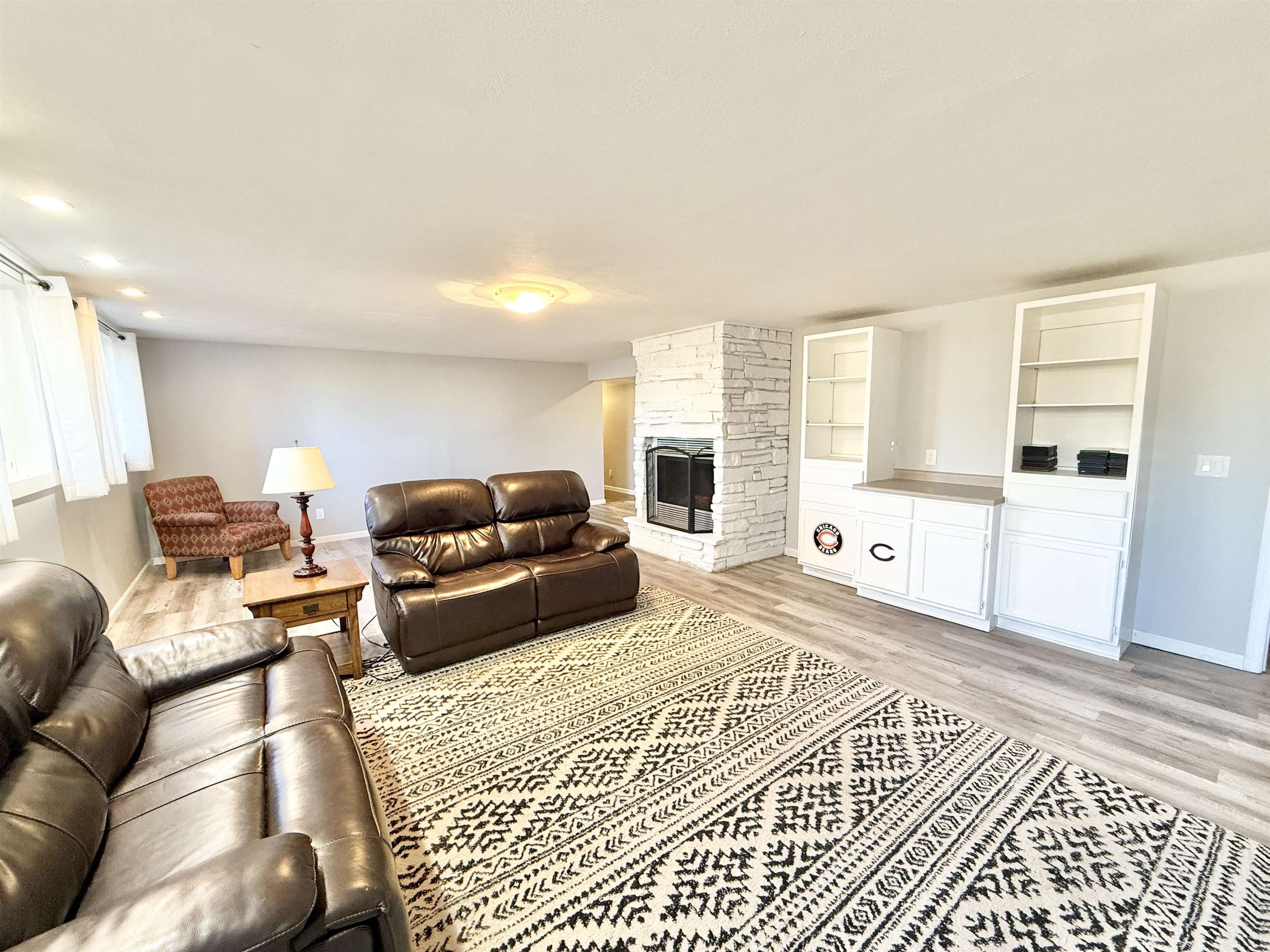 11245 Fox Trail Road Durand, IL 61024 - Photo 36 of 56 a living room with furniture and a rug