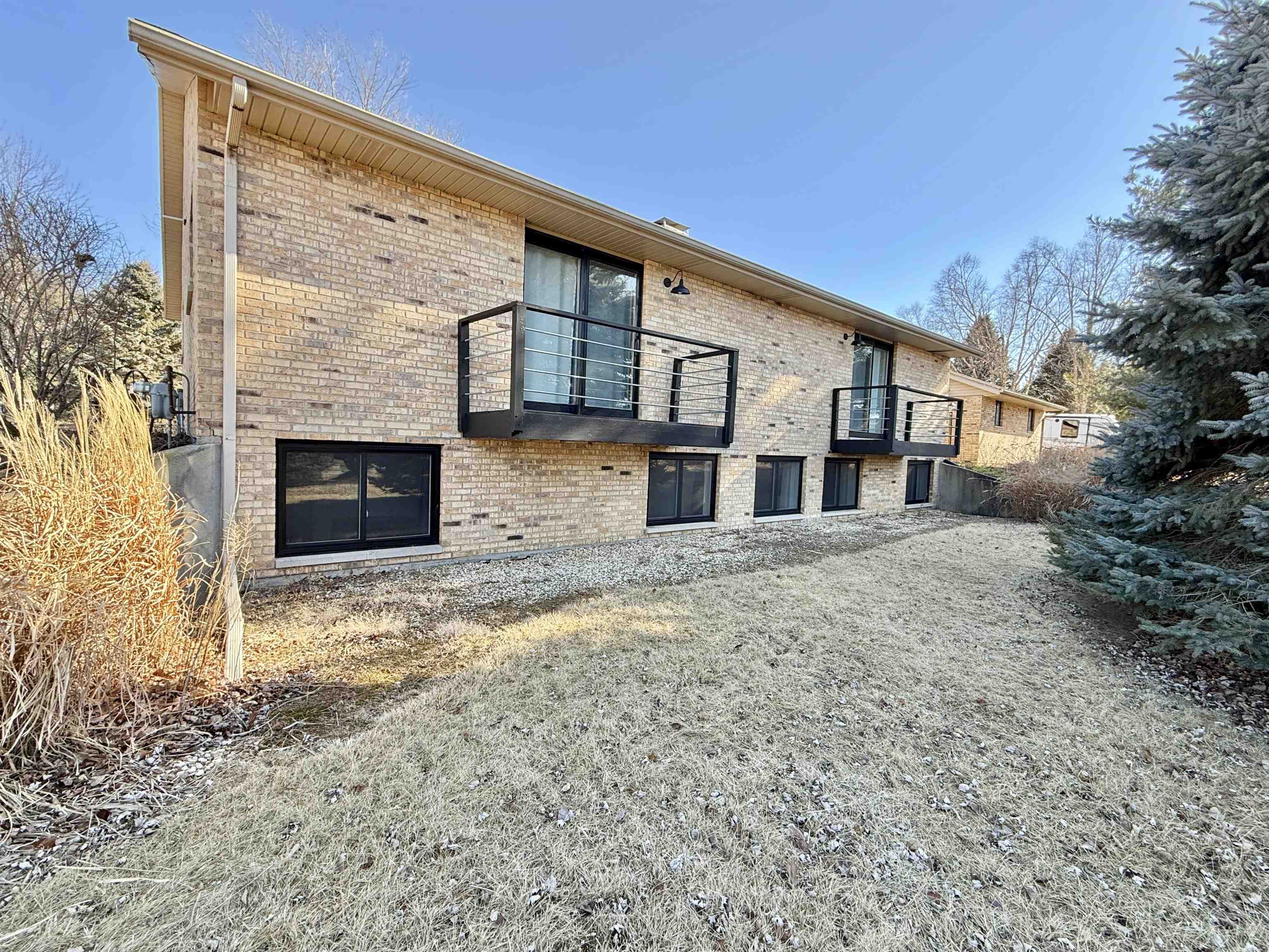 11245 Fox Trail Road Durand, IL 61024 - Photo 4 of 56 a front view of a house with a yard