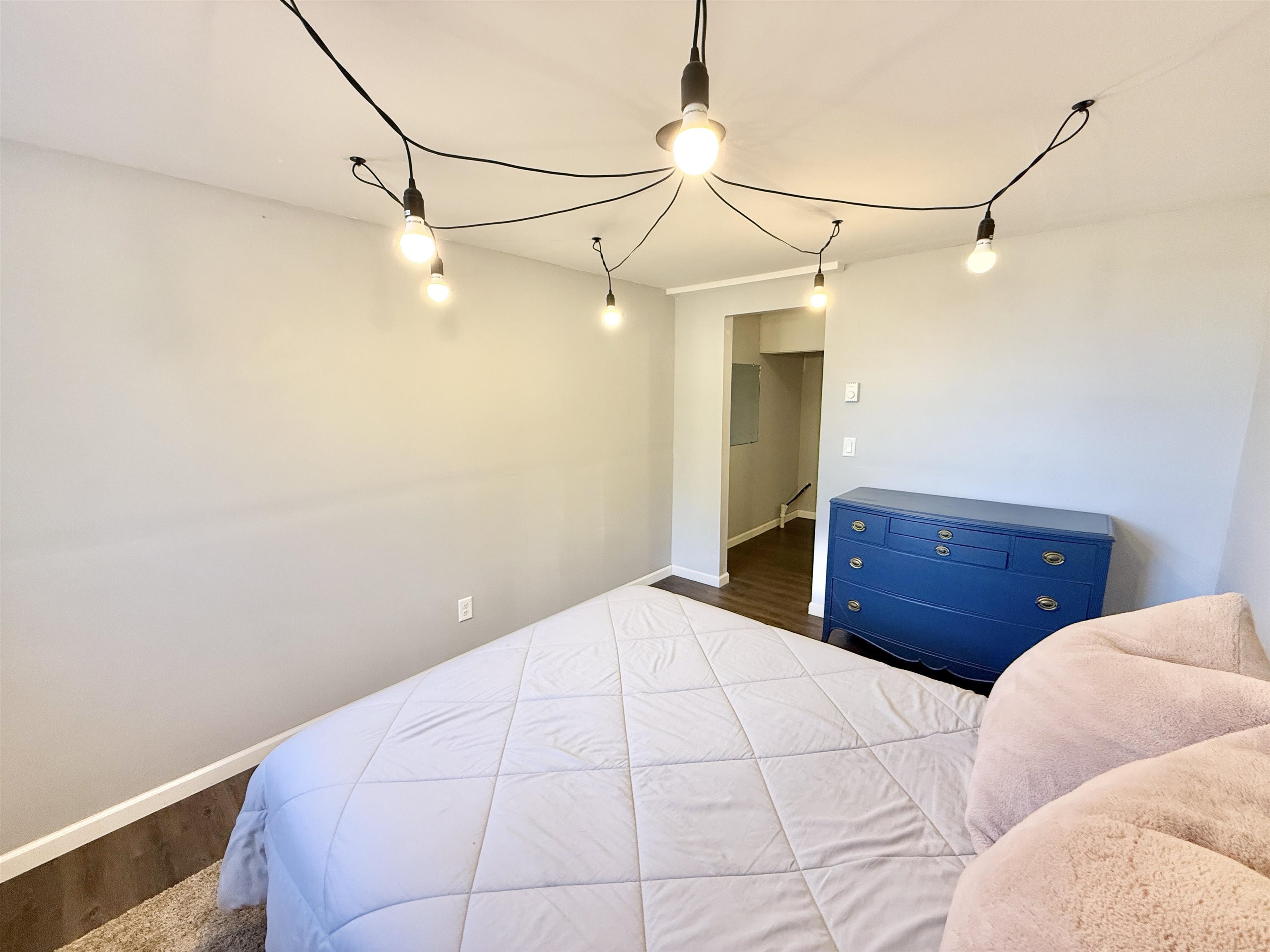 11245 Fox Trail Road Durand, IL 61024 - Photo 43 of 56 a bedroom with a bed and a dresser