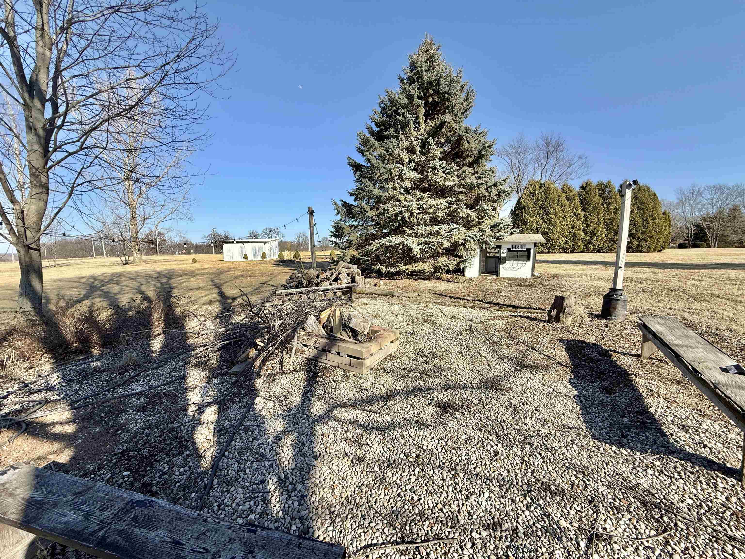 11245 Fox Trail Road Durand, IL 61024 - Photo 50 of 56 a view of a yard with lots of trees