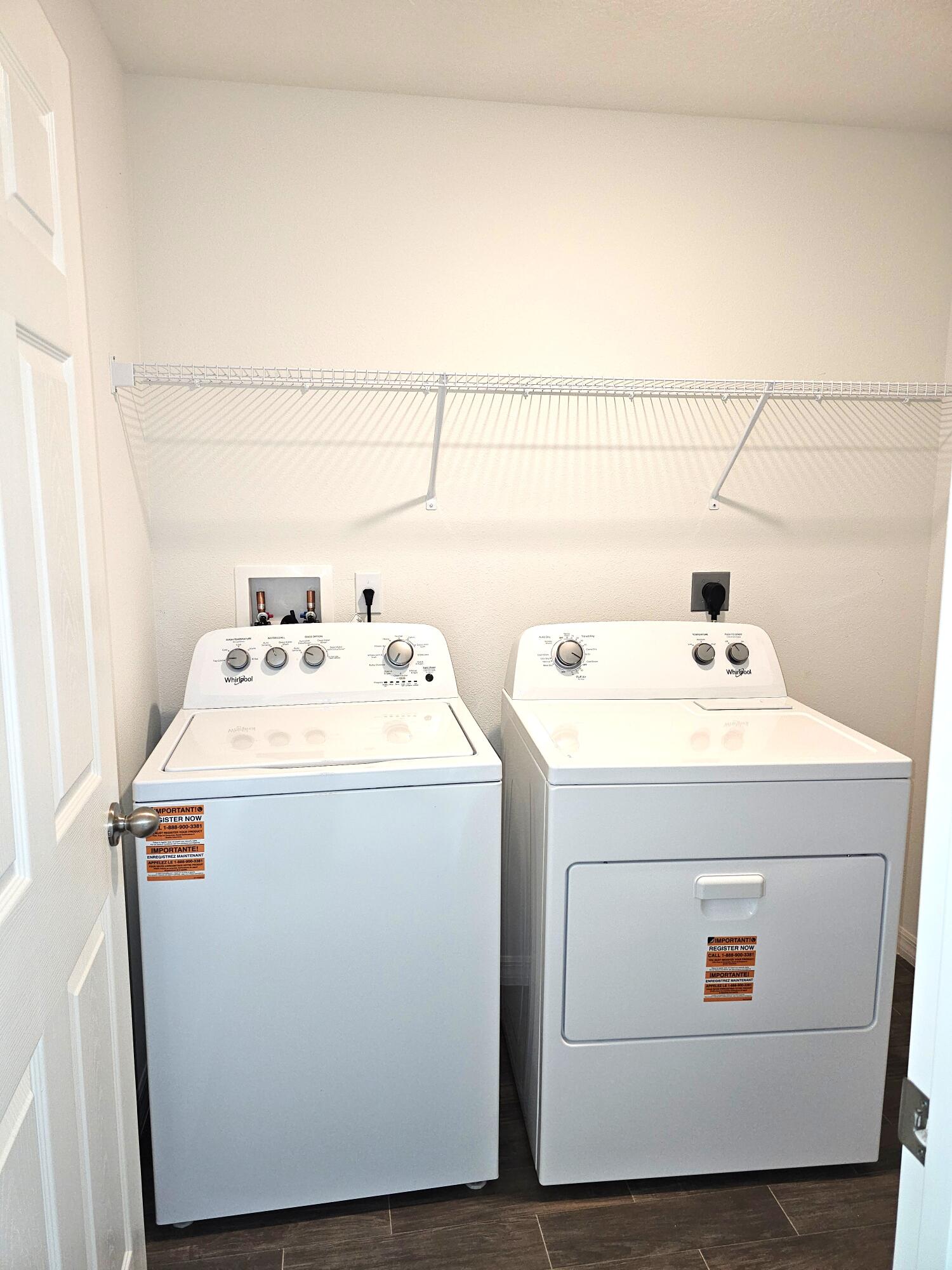 3681 Southwest Haines Street Port St. Lucie, FL 34953 - Photo 17 of 19 a utility room with dryer and washer