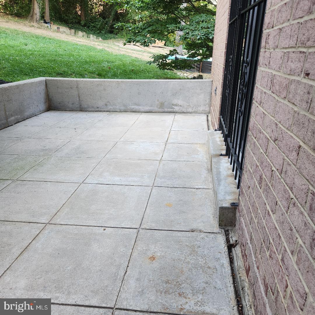 1900 Lyttonsville Road, Unit 216 Silver Spring, MD 20910 - Photo 26 of 38 a view of outdoor space and yard