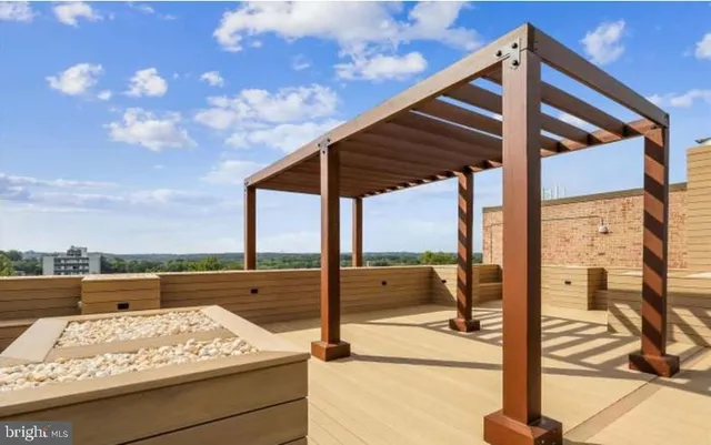 an aerial view of a house a yard and trees