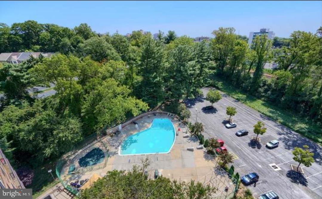 1900 Lyttonsville Road, Unit 216 Silver Spring, MD 20910 - Photo 36 of 38 an aerial view of a house a yard and trees