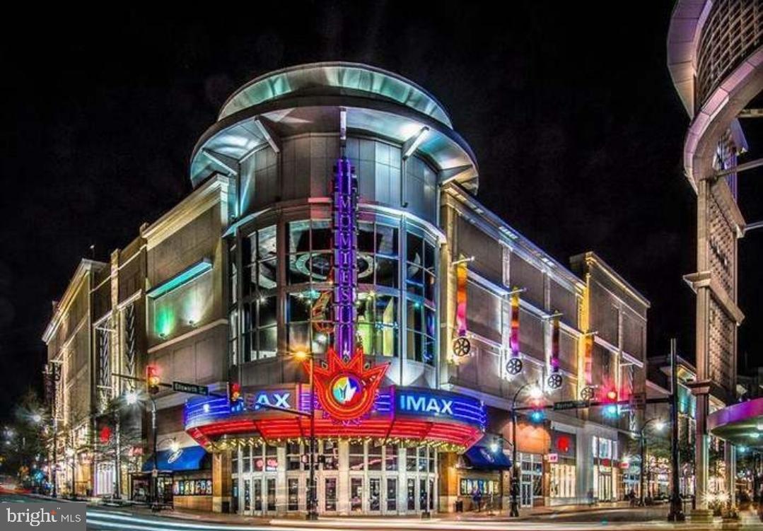 1900 Lyttonsville Road, Unit 216 Silver Spring, MD 20910 - Photo 38 of 38 a front view of multi story residential apartment building with retail shops