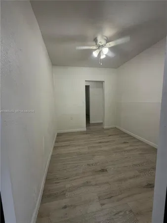 a view of a livingroom with a fan
