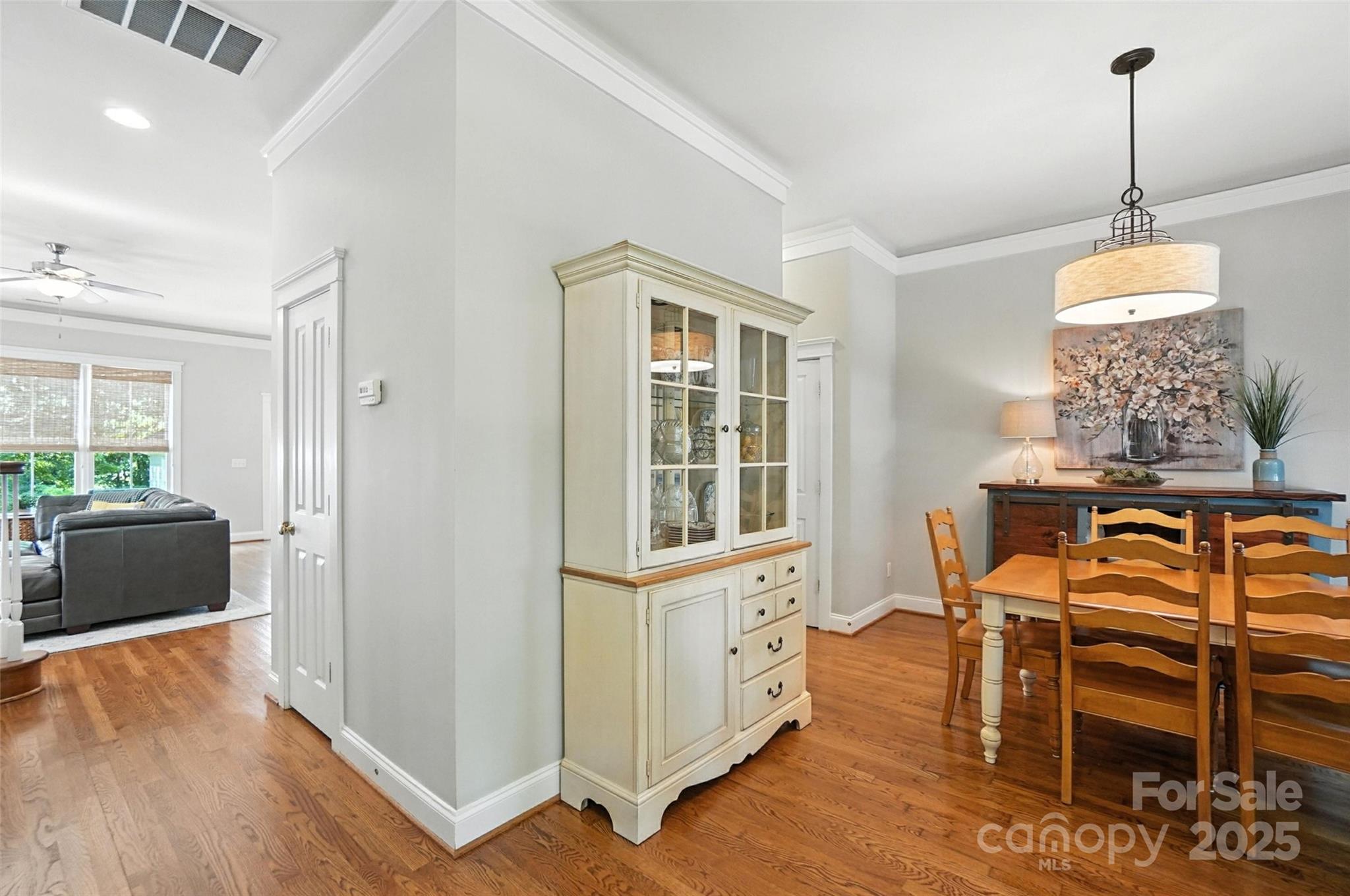 3281 Richard's Crossing Fort Mill, SC 29708 - Photo 12 of 48 a view of a dining room with furniture and wooden floor