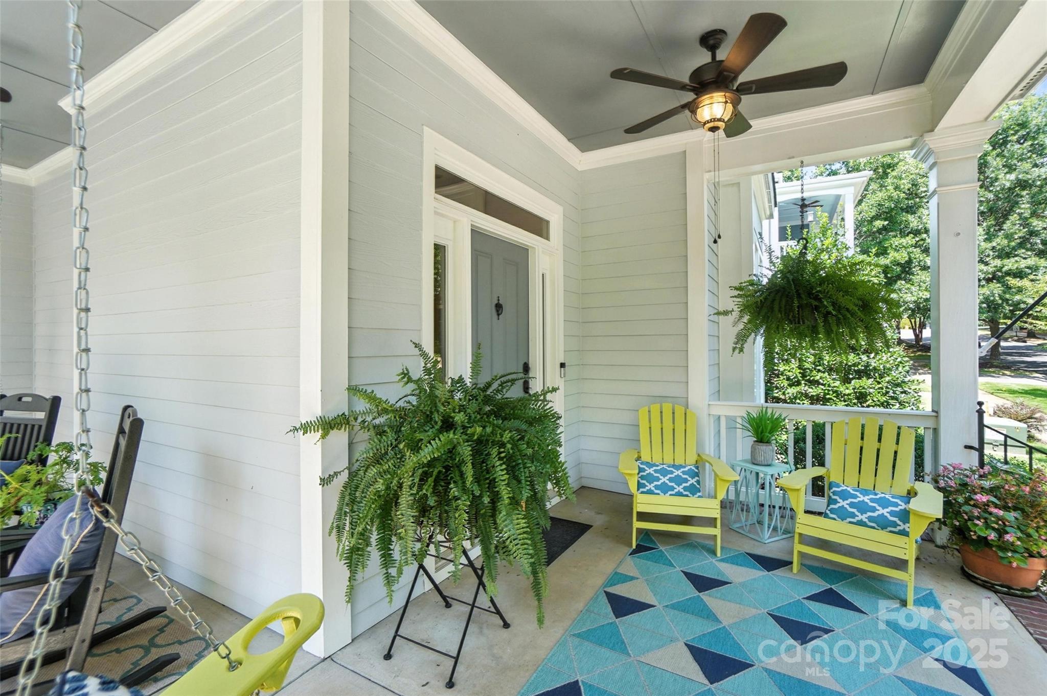 3281 Richard's Crossing Fort Mill, SC 29708 - Photo 8 of 48 a living room with patio furniture and a potted plant
