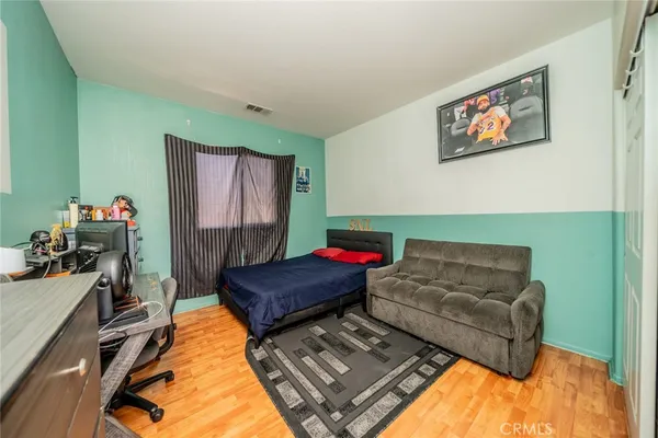 a living room with furniture and a couch