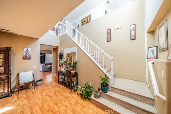 a view of entryway livingroom and hall