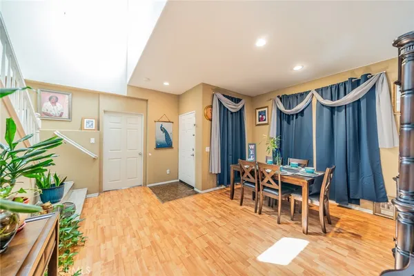 a bed room with a bed and a chair