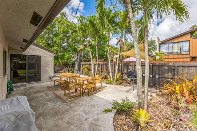 front view of a house with a patio