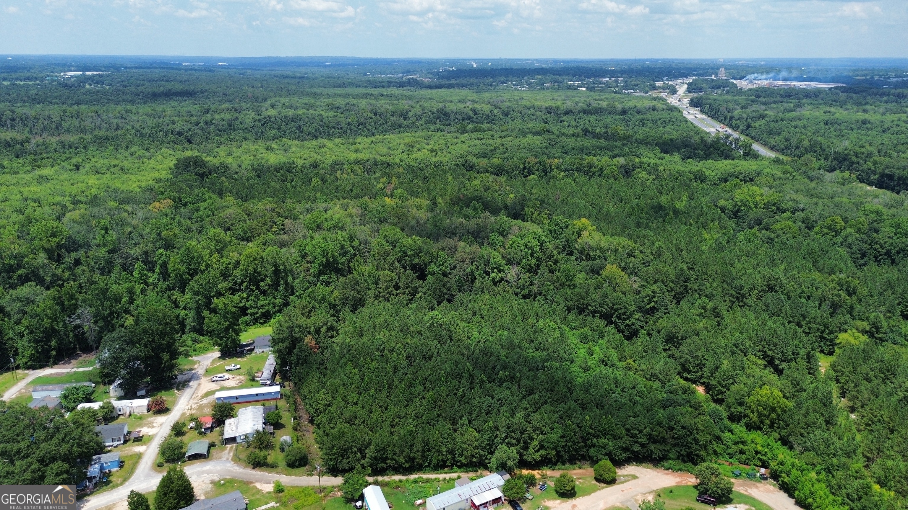 0 Houston Road Macon, GA 31216 - Photo 8 of 19 an aerial view of a house with a yard