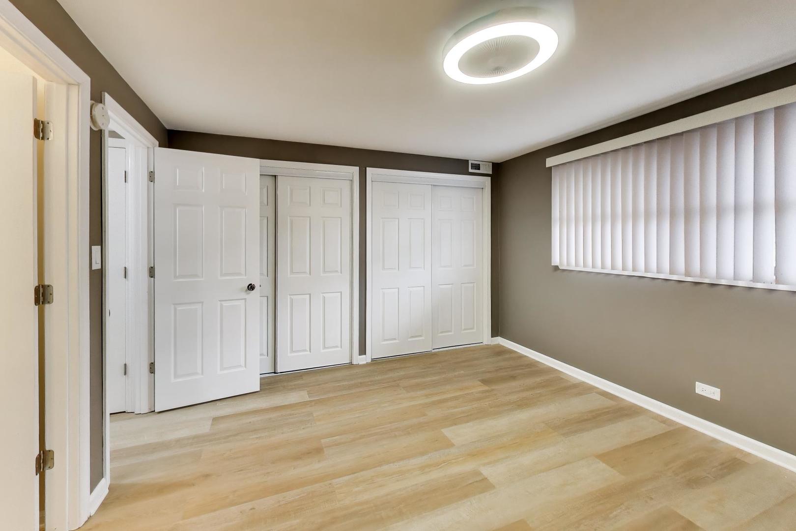 22 North Pistakee Lake Road, Unit 3E Fox Lake, IL 60020 - Photo 14 of 27 a view of an empty room with a window