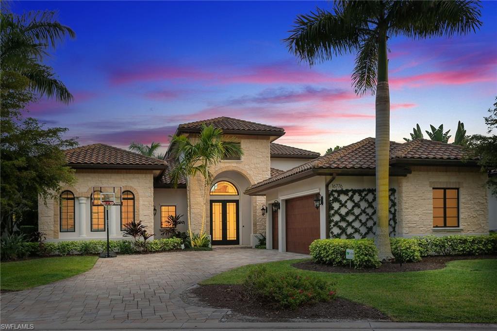 16776 Brightling Way Naples, FL 34110 - Photo 1 of 35 front view of a house with a garden