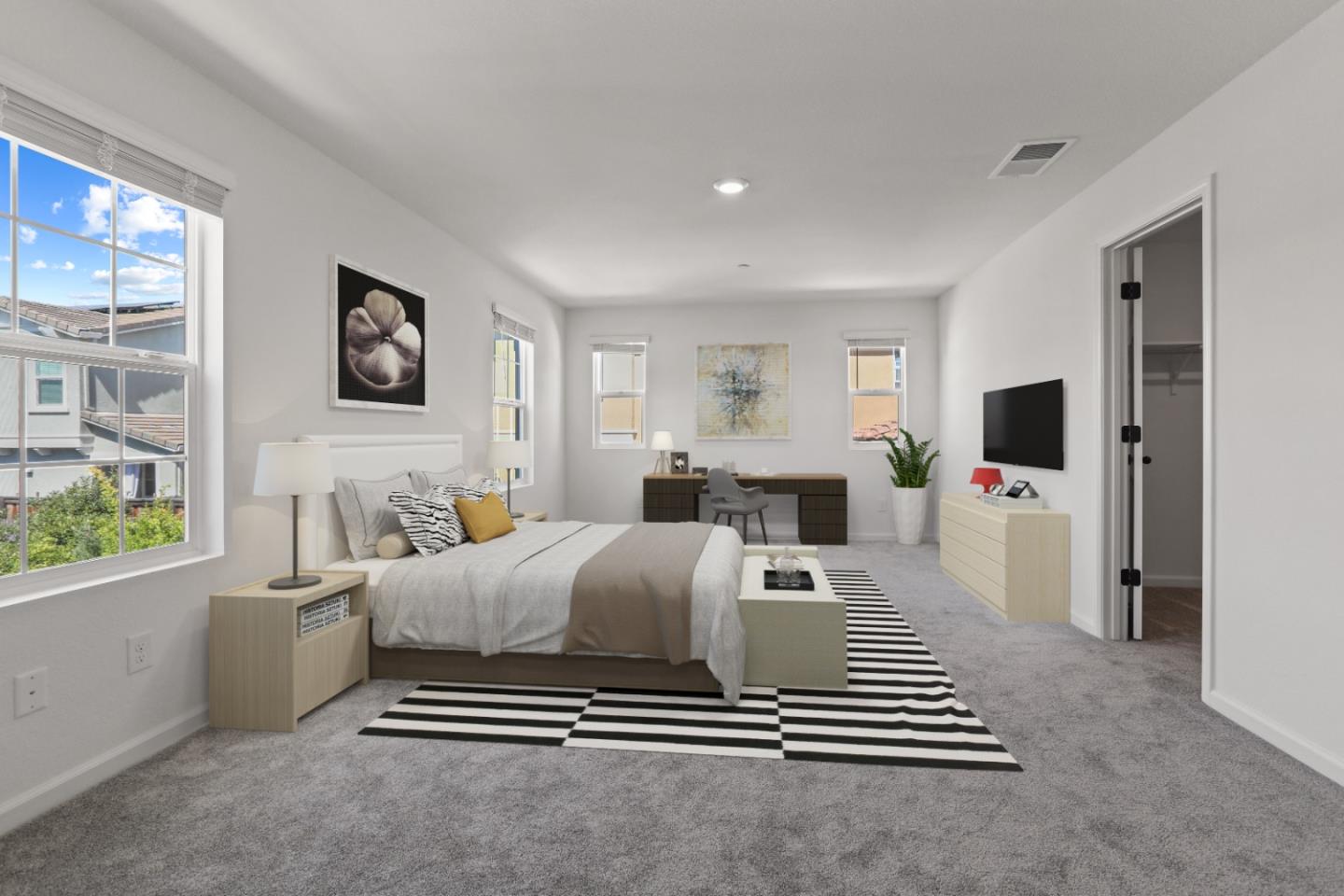 4503 Gray Lodge Loop Rocklin, CA 95677 - Photo 18 of 35 a room with a bed and a flat screen tv