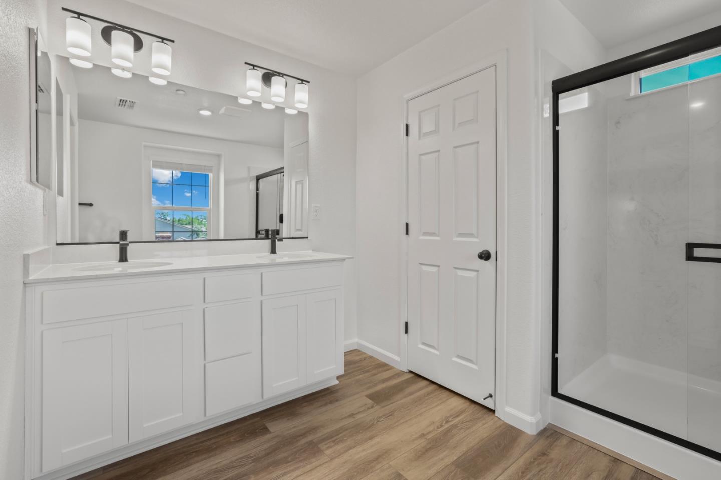 4503 Gray Lodge Loop Rocklin, CA 95677 - Photo 22 of 35 a bathroom with a double vanity sink and a mirror