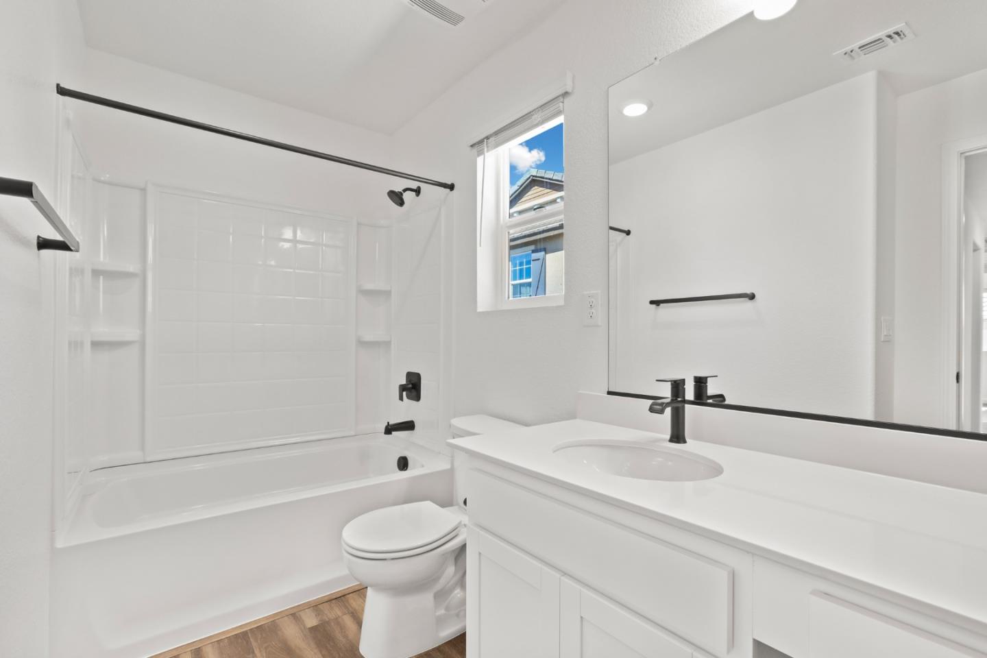 4503 Gray Lodge Loop Rocklin, CA 95677 - Photo 24 of 35 a bathroom with a sink a toilet and shower
