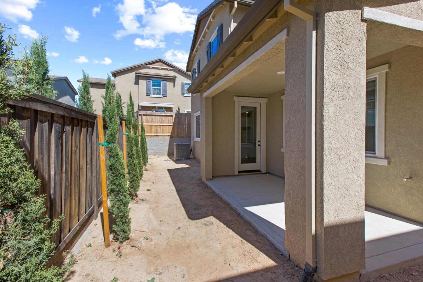 4503 Gray Lodge Loop Rocklin, CA 95677 - Photo 30 of 35 a view of a brick house with a large window