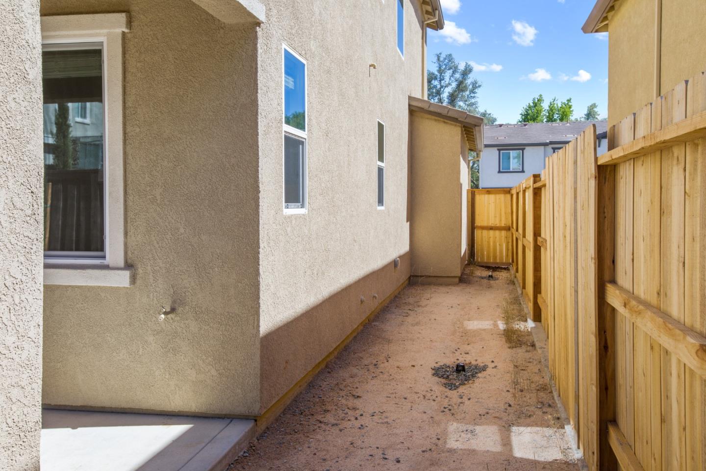 4503 Gray Lodge Loop Rocklin, CA 95677 - Photo 31 of 35 a view of a house with a backyard