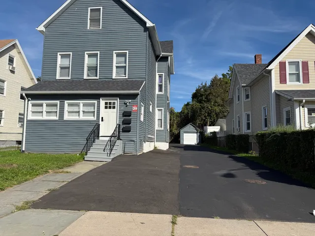 a view of a house with a patio