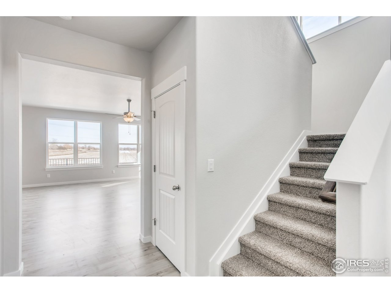 796 Lowry Lane Berthoud, CO 80513 - Photo 25 of 28 a view of entryway with wooden floor