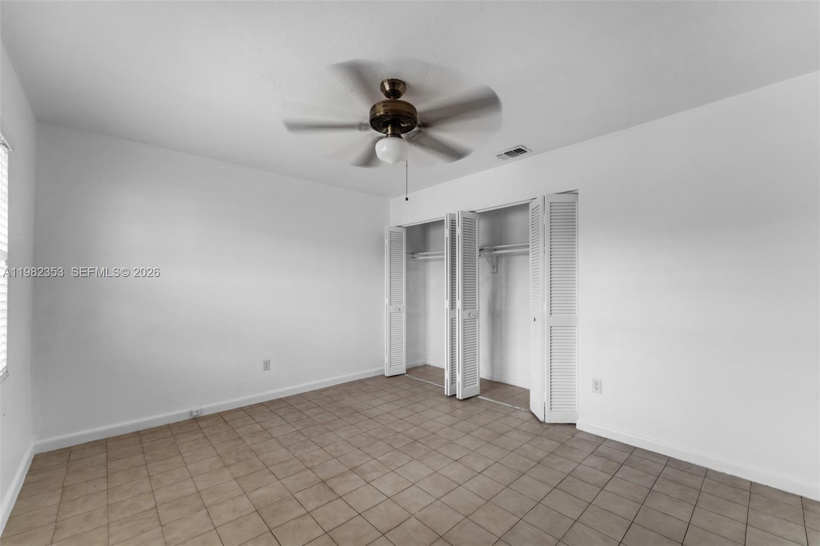 12983 Southwest 18th Terrace Miami, FL 33175 - Photo 12 of 25 a view of an empty room