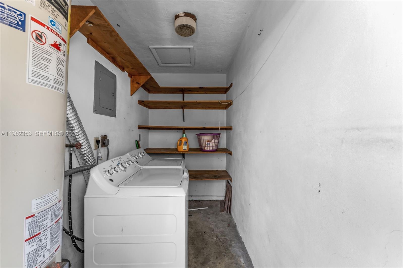 12983 Southwest 18th Terrace Miami, FL 33175 - Photo 17 of 25 a utility room with dryer and washer