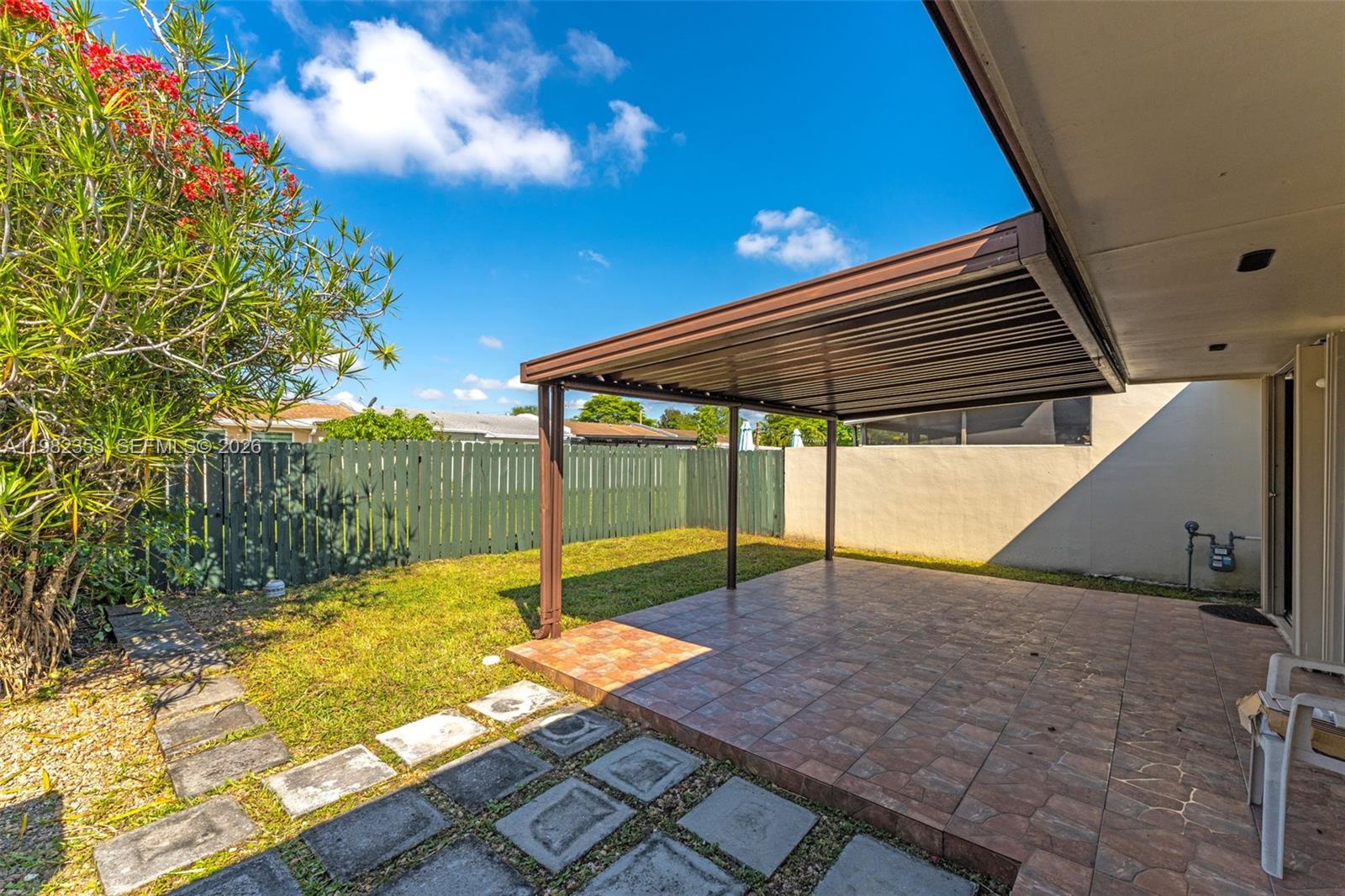 12983 Southwest 18th Terrace Miami, FL 33175 - Photo 18 of 25 a view of backyard with swimming pool