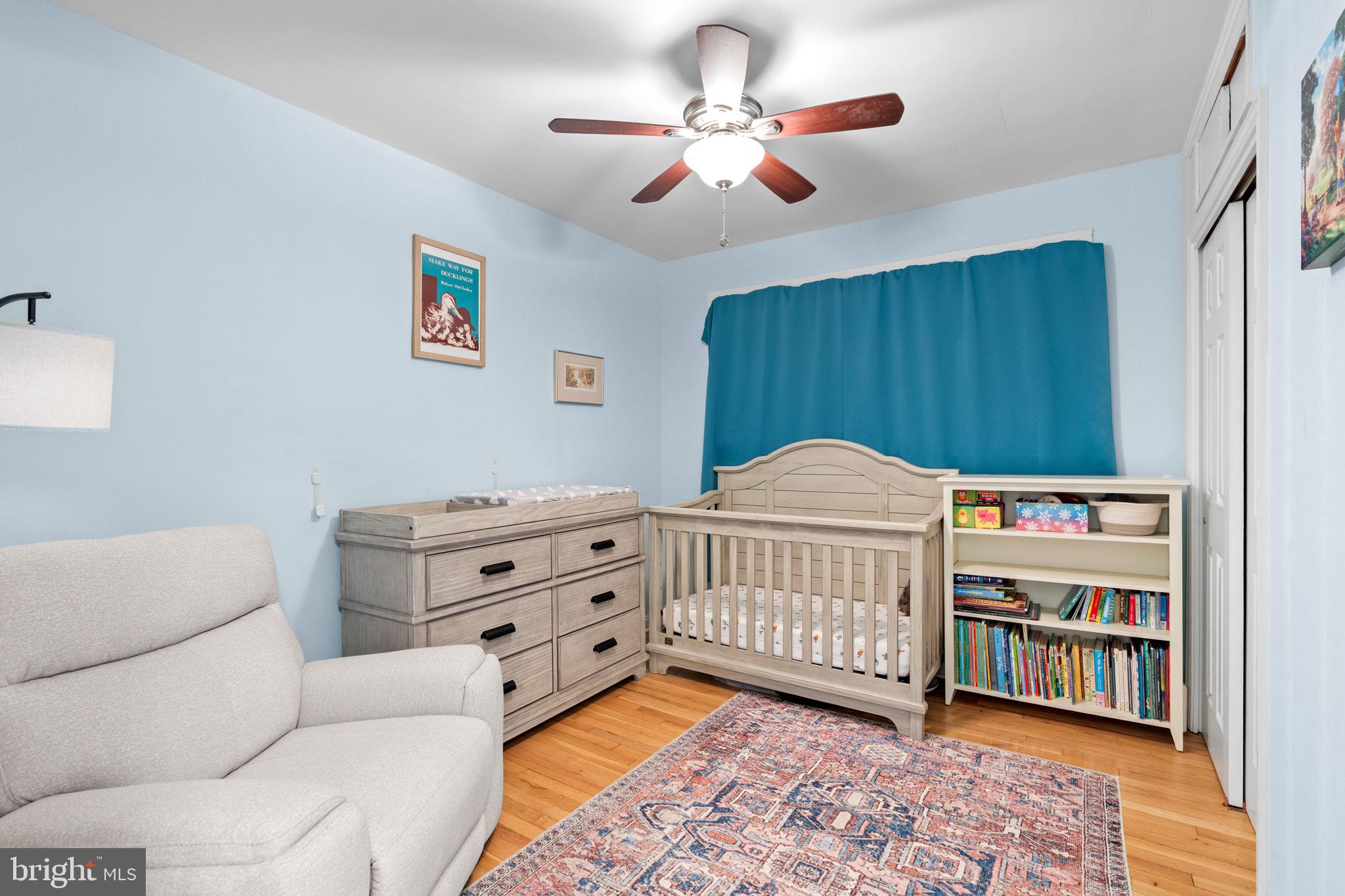 10310 Brunswick Avenue Silver Spring, MD 20902 - Photo 18 of 43 Charming nursery with soothing hues.