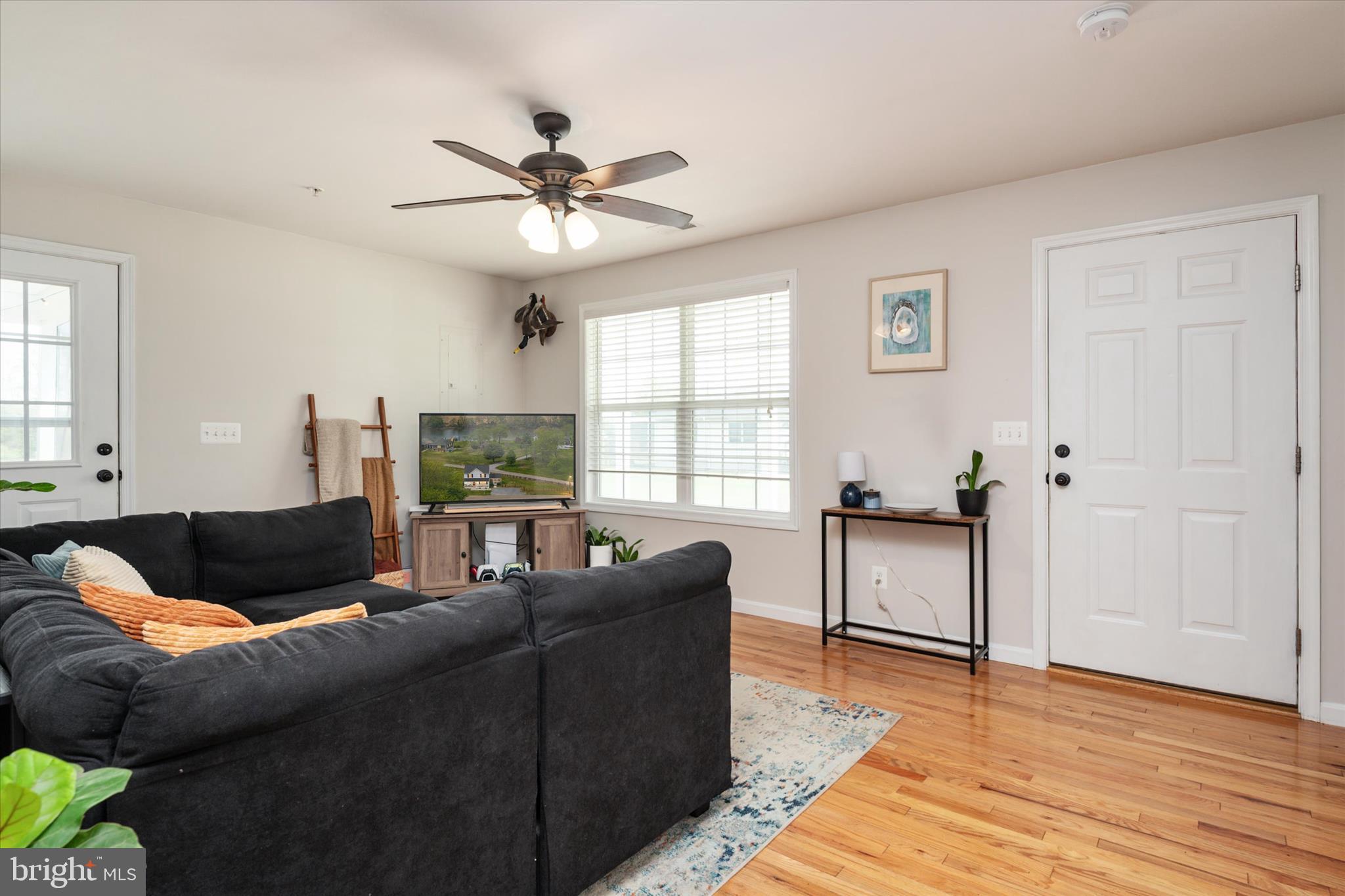 200 Newtown Road Chester, MD 21619 - Photo 10 of 50 a living room with furniture and a window