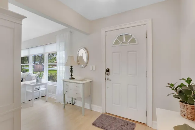a view of a livingroom with furniture and windows