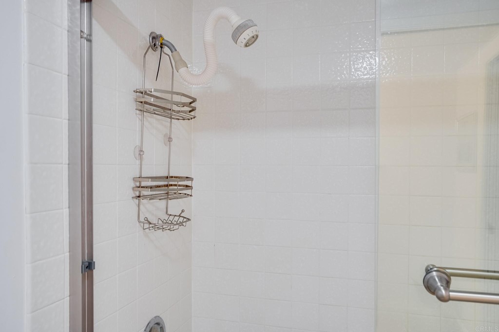 573 South Sierra Avenue, Unit 8 Solana Beach, CA 92075 - Photo 31 of 54 a bathroom with a shower