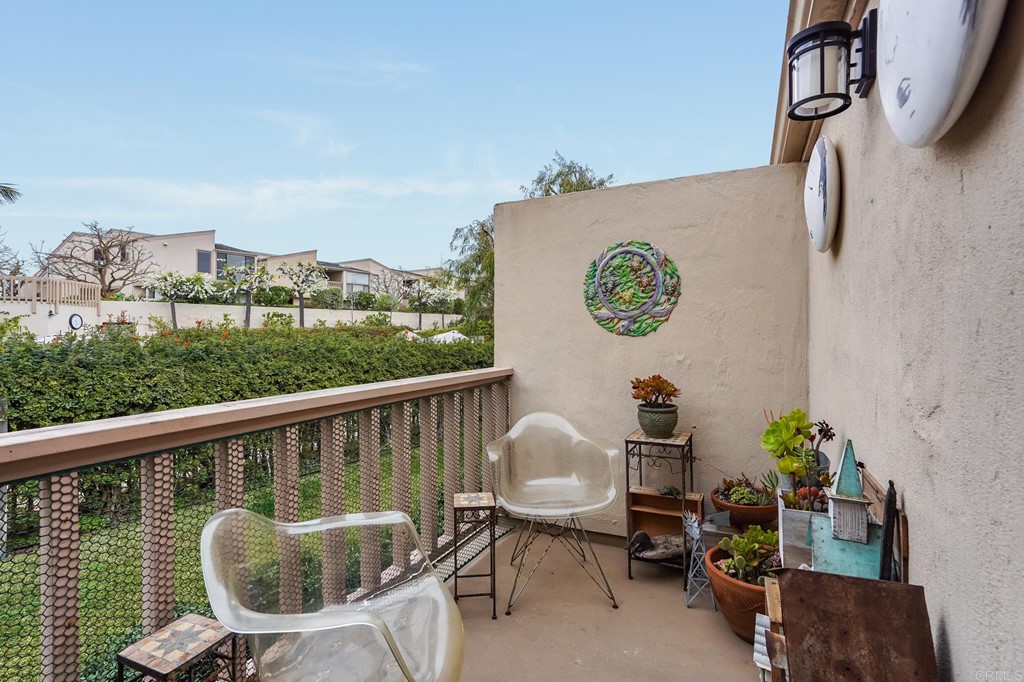 573 South Sierra Avenue, Unit 8 Solana Beach, CA 92075 - Photo 33 of 54 a view of a balcony with chairs