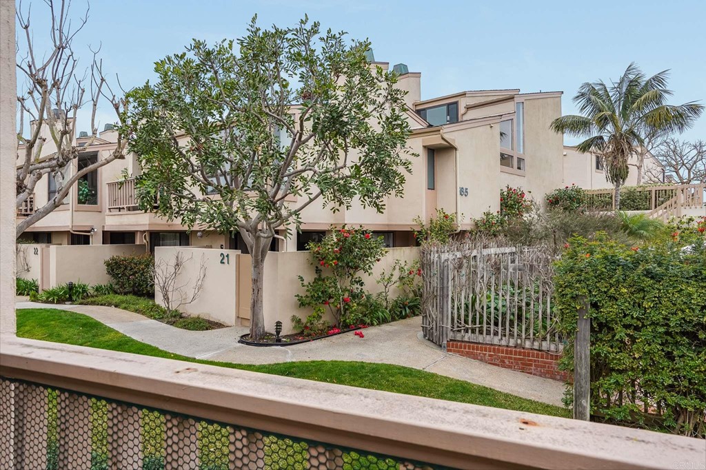 573 South Sierra Avenue, Unit 8 Solana Beach, CA 92075 - Photo 39 of 54 a view of a house with a small yard and plants