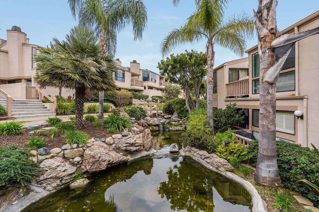 573 South Sierra Avenue, Unit 8 Solana Beach, CA 92075 - Photo 40 of 54 a view of a house with a yard and swimming pool