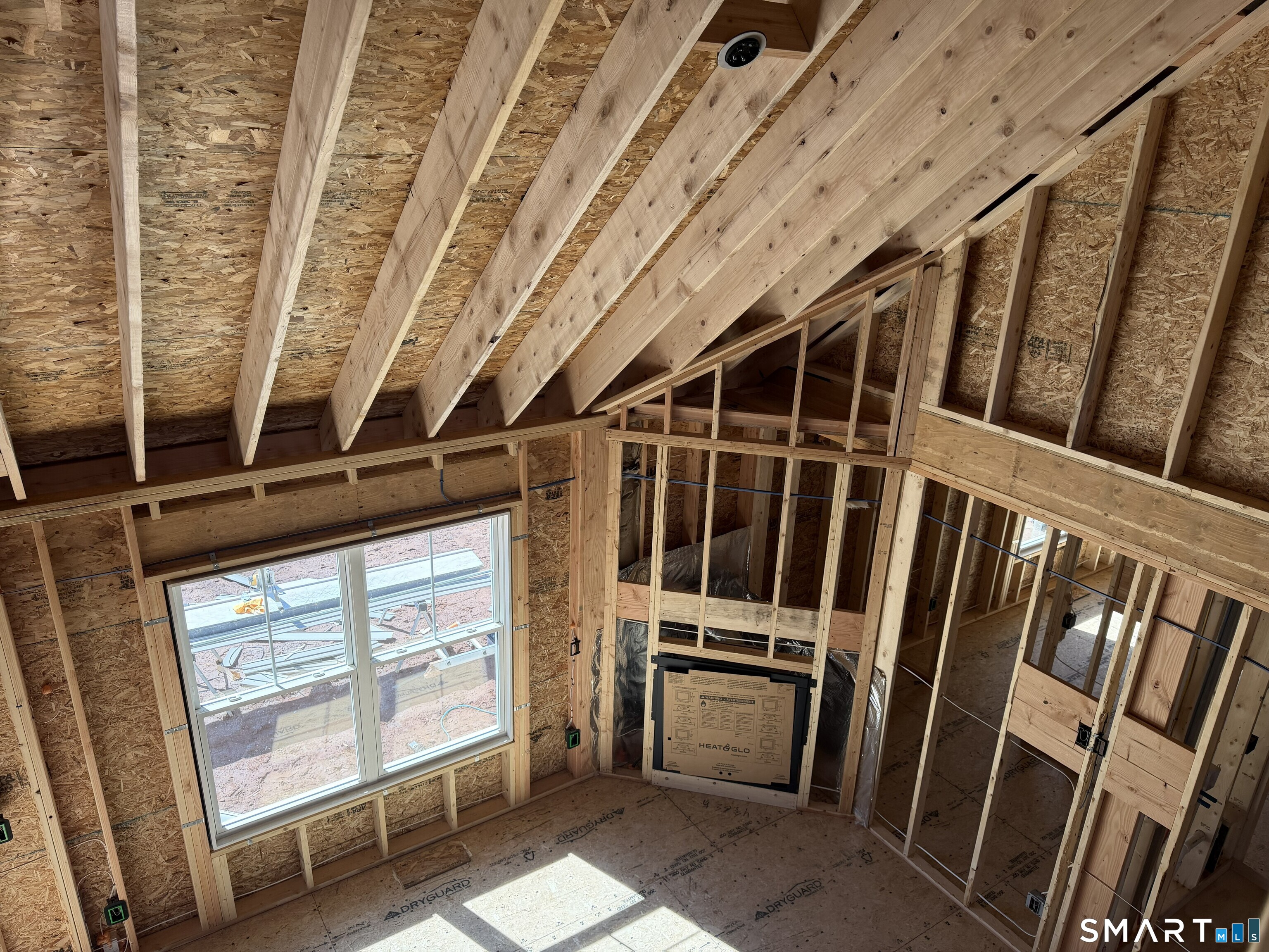 25 Julia Road Bristol, CT 06010 - Photo 11 of 20 a view of an empty room with wooden floor and windows