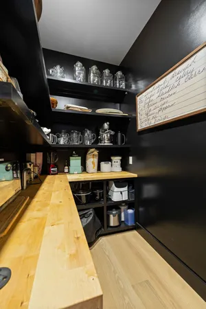 a en suite bathroom with double sink and a large mirror
