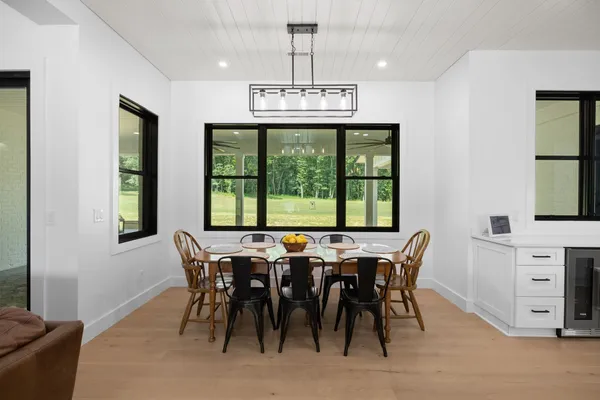 a kitchen with sink cabinets and window