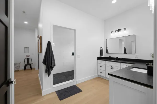 a bathroom with a sink and mirror