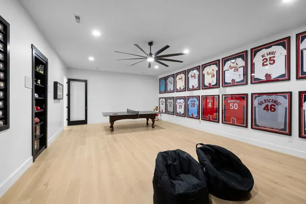a bathroom with a sink mirror toilet and shower