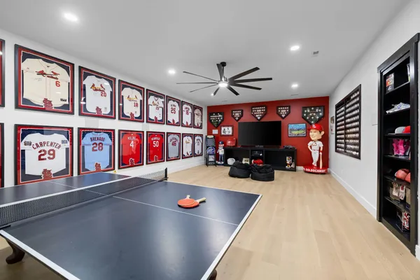 a bedroom with a bed and a couch