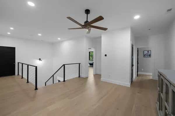 a view of a house with backyard and porch